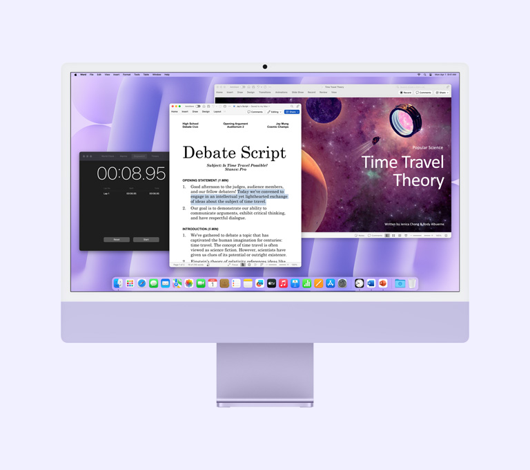 Fialový iMac: Obrazovka zobrazuje apky Microsoft Word, Microsoft PowerPoint a Hodiny