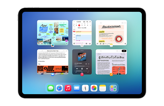 iPad ในแนวนอน แสดงหน้าจอที่มีหน้าต่าง 6 บานเปิดอยู่ใน 2 แถว รวมถึงแอปปฏิทิน, โน้ต, Apple Music และ Safari